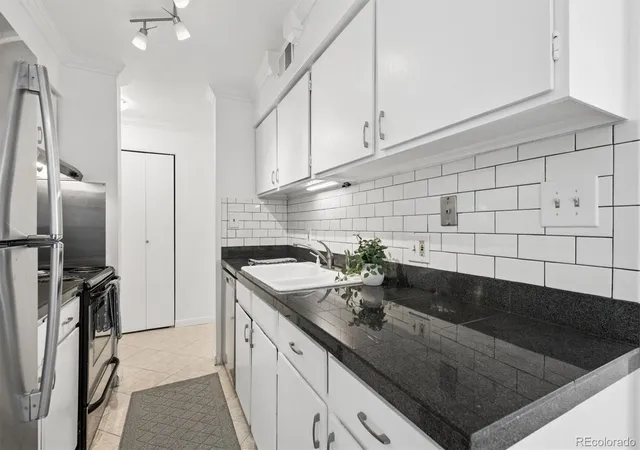 Listing Photo 3 - Condo for sale in building located at 7665 E Quincy Ave, Denver, CO 80237 - Unit #204