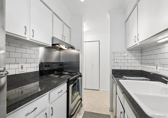 Listing Photo 4 - Condo for sale in building located at 7665 E Quincy Ave, Denver, CO 80237 - Unit #204