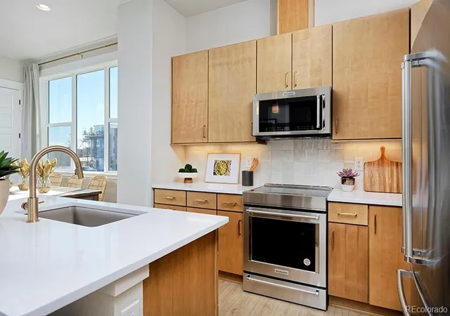 Photo 4 of Townhouse for sale at 2866 S Machebeuf Ct, Denver, CO 80236 | MLS# 6926181 | Listing updated on 2026-09-14