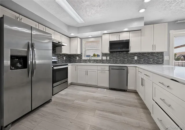 5th image of 5881 S Quatar Cir, Centennial, CO 80015 | MLS# 4631831