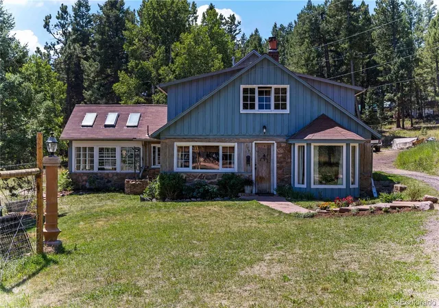 Photo 2 of Single family home for sale at 28894 Corkwood Ln, Evergreen, CO 80439 | MLS# 2344383 | Listing updated on 2026-10-06