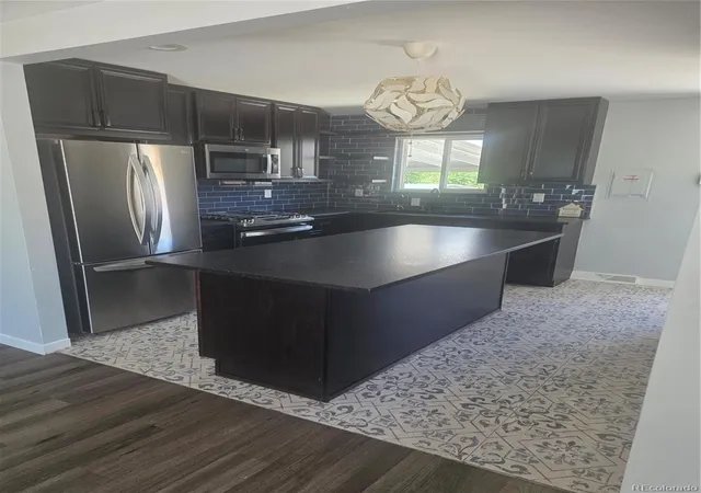 Photo 3 of Single family home for sale at 6196 Oneida St, Commerce City, CO 80022 | MLS# 3920292 | Listing updated on 2026-08-14