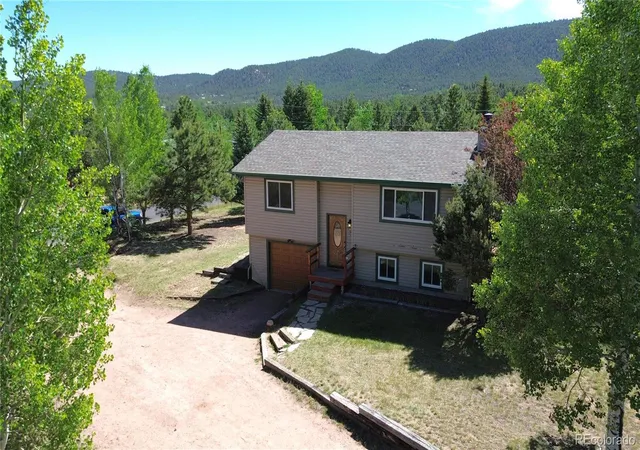 2nd image of 1056 Sundance Cir, Woodland Park, CO 80863 | MLS# 8561996