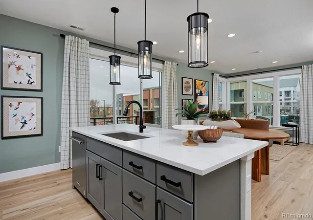 Photo 2 of Townhouse for sale at 3145 W Bates Ave, Denver, CO 80236 | MLS# 7246270 | Listing updated on 2026-09-14