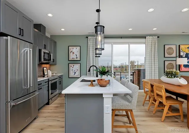 Photo 3 of Townhouse for sale at 3145 W Bates Ave, Denver, CO 80236 | MLS# 7246270 | Listing updated on 2026-09-14