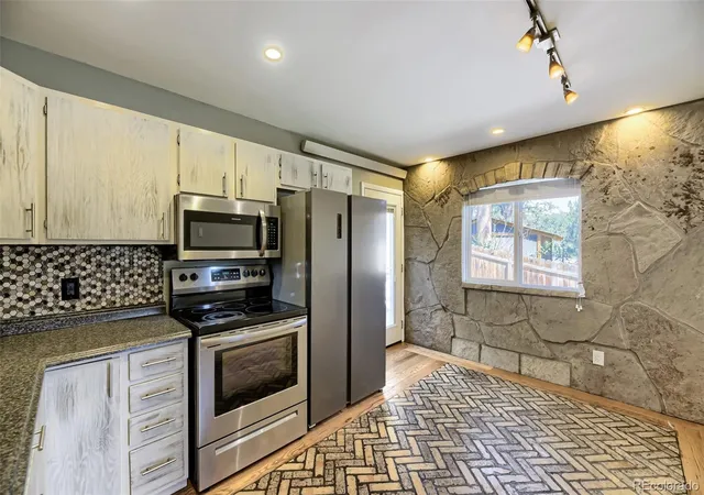Photo 5 of Single family home for sale at 30157 Aspen Ln, Evergreen, CO 80439 | MLS# 5193723 | Listing updated on 2026-08-08