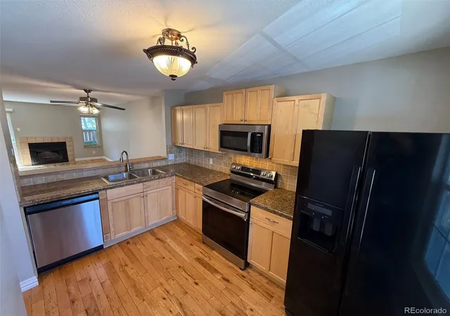 Listing Photo 5 - Condo for sale in building located at 10577 W Maplewood Dr, Littleton, CO 80120 - Unit #B