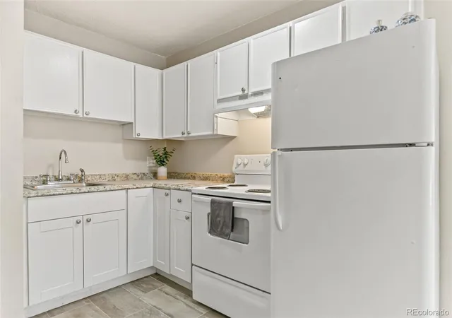 Listing Photo 3 - Condo for sale in building located at 560 Dayton St, Aurora, CO 80010