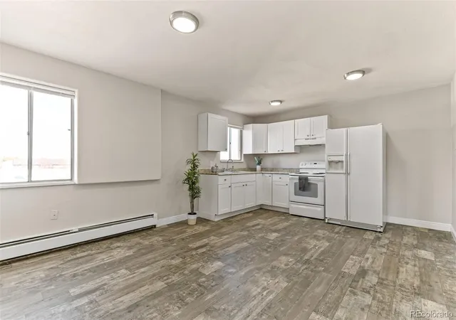Listing Photo 4 - Condo for sale in building located at 560 Dayton St, Aurora, CO 80010
