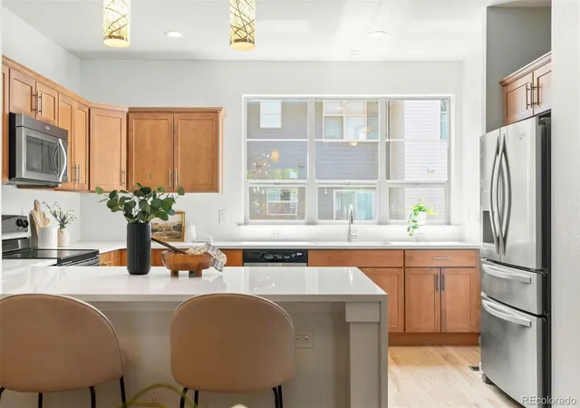 Photo 3 of Townhouse for sale at 7020 W Virginia Pl, Lakewood, CO 80226 | MLS# 7217520 | Listing updated on 2026-09-19