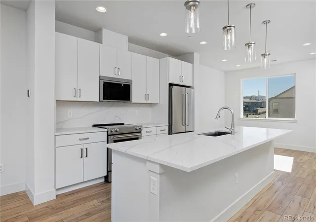 Photo 1 of Townhouse for sale at 3139 W Bates Ave, Denver, CO 80236 | MLS# 4492522 | Listing updated on 2026-09-14