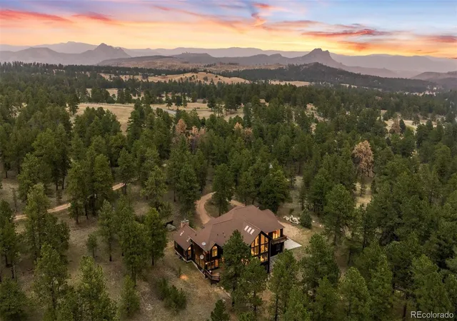 Photo 4 of Single family home for sale at 21206 Spring Crk Rd, Buffalo Creek, CO 80425 | MLS# 7153837 | Listing updated on 2026-09-24