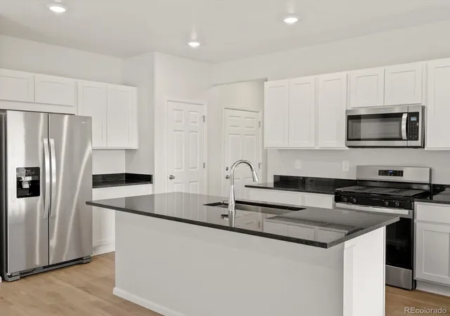 2nd image of 512 97th Ave, Greeley, CO 80634 | MLS# 9206068