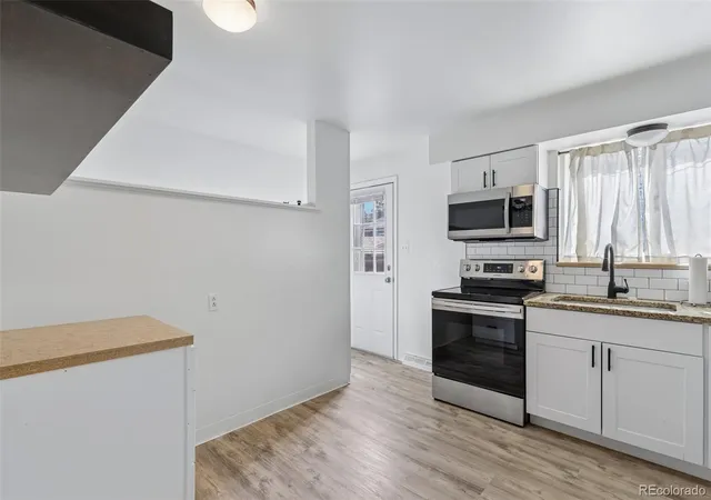 Photo 3 of Townhouse for sale at 2021 Jay St, Denver, CO 80214 | MLS# 8121463 | Listing updated on 2026-10-16