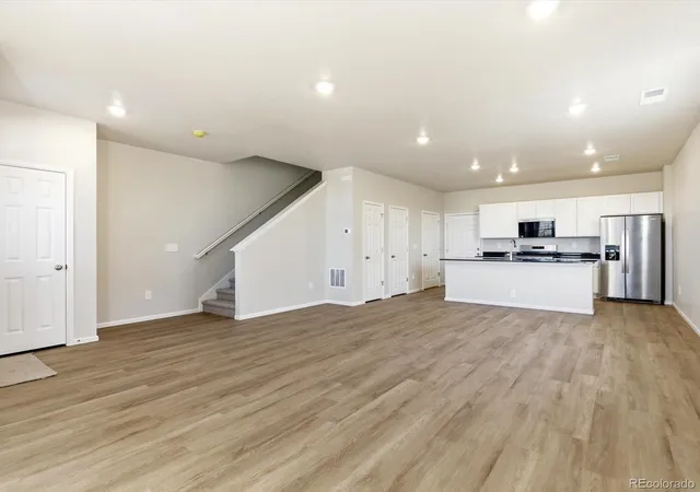 Photo 3 of Townhouse for sale at 1596 Riverplace Dr #5, Windsor, CO 80550 | MLS# 5033691 | Listing updated on 2026-09-21