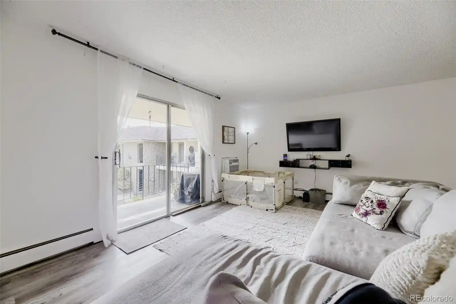 Listing Photo 2 - Condo for sale in 4531 S Lowell Blvd located at 4531 S Lowell Blvd, Denver, CO 80236 - Unit 4531 S Lowell Blvd