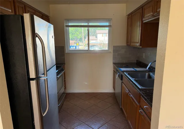 Photo 4 of Sale Pending at 8770 Rainbow Ave #1, Denver, CO 80229 | MLS# 7477064 | Listing updated on 2026-09-21