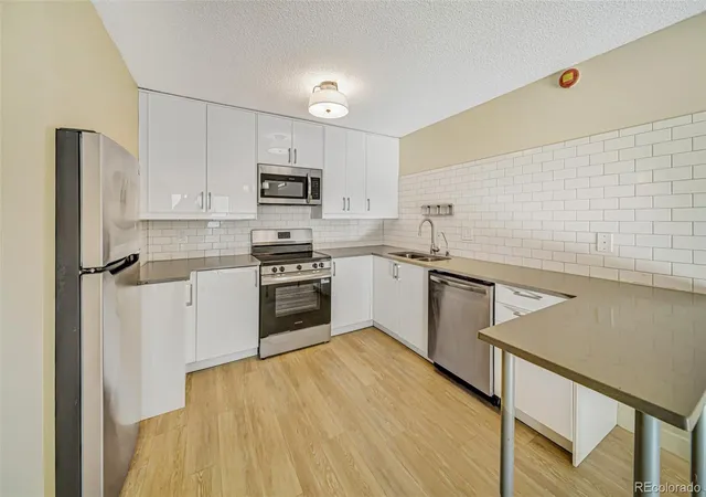 2nd image of 7040 E Girard Ave #210, Denver, CO 80224 | MLS# 1945754