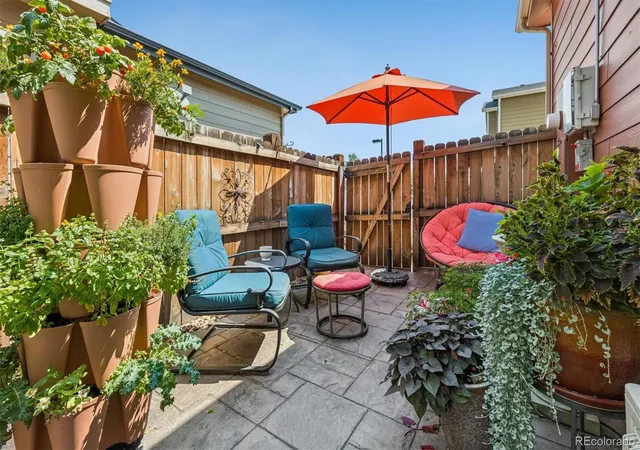 Photo 3 of Townhouse for sale at 1212 S Clinton St, Denver, CO 80247 | MLS# 8681887 | Listing updated on 2026-09-13
