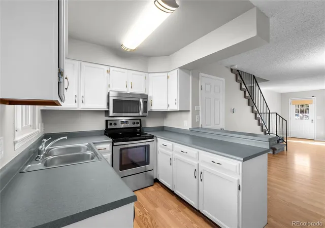 Photo 3 of Townhouse for sale at 1811 S Quebec Way #143, Denver, CO 80231 | MLS# 4896839 | Listing updated on 2026-10-12