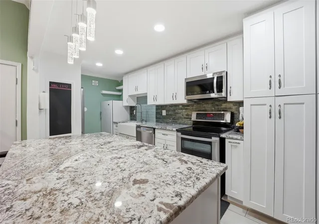 Listing Photo 3 - Condo for sale in building located at 3482 S Eagle St, Aurora, CO 80014 - Unit #203