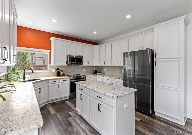 Photo 3 of Single family home for sale at 7664 Bison Ct, Littleton, CO 80125 | MLS# 9559103 | Listing updated on 2026-10-05