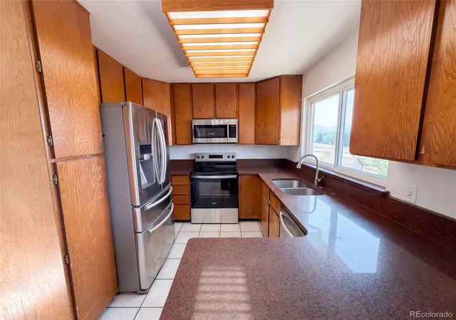 Photo 2 of Single family home for sale at 8273 W Plymouth Pl, Littleton, CO 80128 | MLS# 6100018 | Listing updated on 2026-09-03