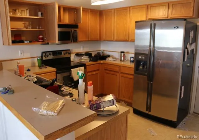 Photo 4 of Townhouse for sale at 15555 E 40th Avenue #48, Denver, CO 80239 | MLS# 8621604 | Listing updated on 2026-08-12