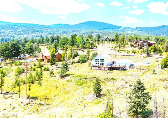 Photo 1 of Single family home for sale at 34877 Forest Ests Rd, Evergreen, CO 80439 | MLS# 7295510 | Listing updated on 2026-10-07