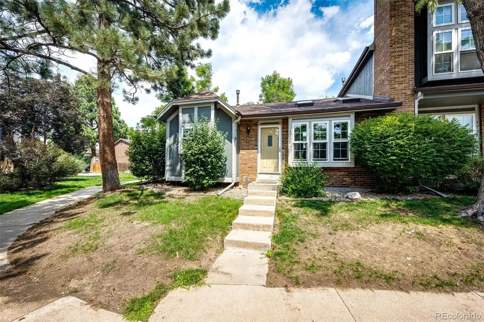 Listing Photo 1 - Condo for sale in 1220 S Flower Cir located at 1220 S Flower Cir, Lakewood, CO 80232 - Unit 1220 S Flower Cir