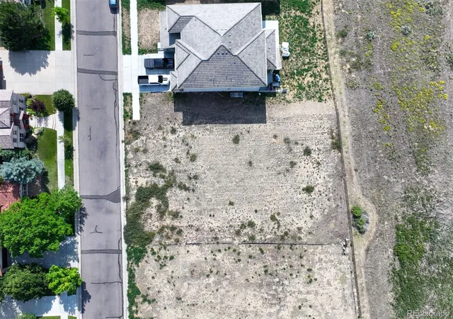 Photo 3 of Land for sale at 16371 Fairway Dr, Commerce City, CO 80022 | MLS# 8648092 | Listing updated on 2026-10-08