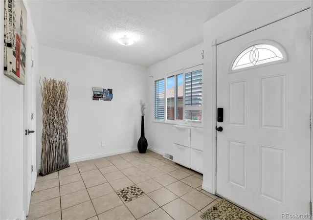 Photo 3 of Townhouse for sale at 12005 E Yale Ave, Aurora, CO 80014 | MLS# 7489091 | Listing updated on 2026-08-25