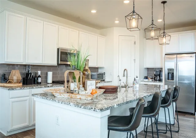 Photo 4 of Single family home for sale at 14450 Hudson St, Thornton, CO 80602 | MLS# 7563857 | Listing updated on 2026-08-28