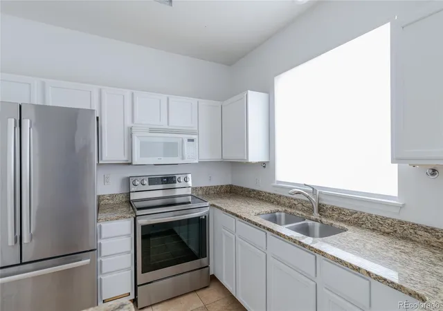 Photo 3 of Townhouse for sale at 4050 E 119th Place #A, Thornton, CO 80233 | MLS# 4226870 | Listing updated on 2026-09-02