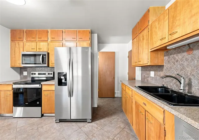 Photo 3 of Single family home for sale at 8035 E Jefferson Pl, Denver, CO 80237 | MLS# 8070125 | Listing updated on 2026-10-07