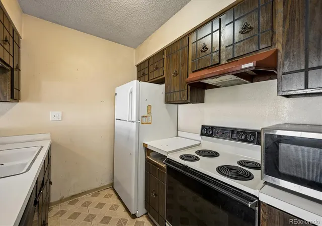 Photo 4 of Townhouse for sale at 7309 W Hampden Ave #4801, Lakewood, CO 80227 | MLS# 5071548 | Listing updated on 2026-08-28