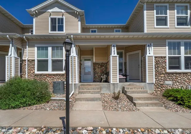 Photo 1 of Townhouse for sale at 6042 Ensemble Hts, Colorado Springs, CO 80923 | MLS# 9861614 | Listing updated on 2026-08-17