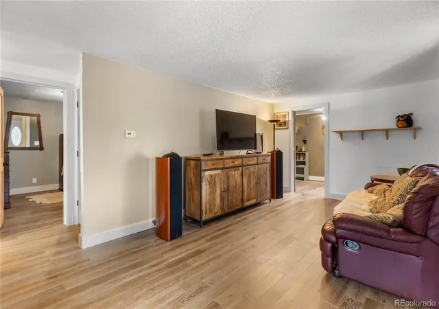 Photo 4 of Single family home for sale at 7491 Locust St, Commerce City, CO 80022 | MLS# 7846389 | Listing updated on 2026-09-02