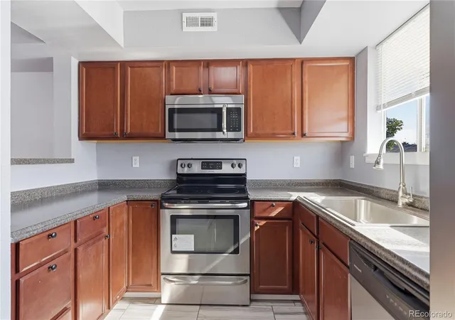 Photo 2 of Townhouse for sale at 8199 Welby Rd #1406, Denver, CO 80229 | MLS# 5385488 | Listing updated on 2026-08-19