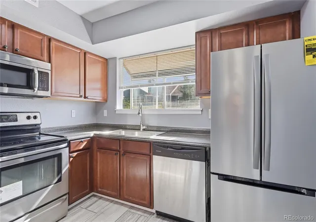 Photo 3 of Townhouse for sale at 8199 Welby Rd #1406, Denver, CO 80229 | MLS# 5385488 | Listing updated on 2026-08-19