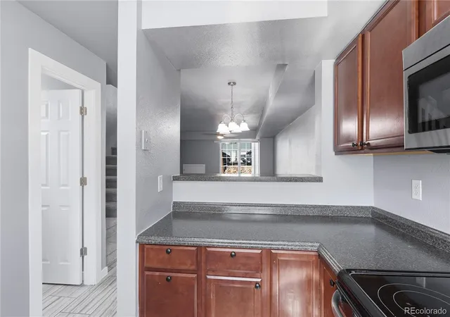 Photo 4 of Townhouse for sale at 8199 Welby Rd #1406, Denver, CO 80229 | MLS# 5385488 | Listing updated on 2026-08-19