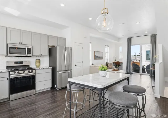 Photo 3 of Townhouse for sale at 1651 W 67Th Cir, Denver, CO 80221 | MLS# 6130901 | Listing updated on 2026-10-07