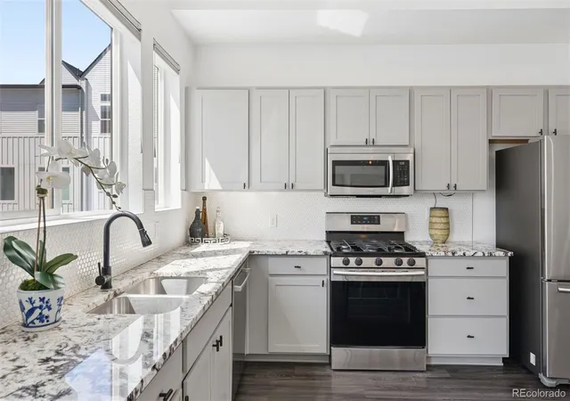 Photo 4 of Townhouse for sale at 1651 W 67Th Cir, Denver, CO 80221 | MLS# 6130901 | Listing updated on 2026-10-07