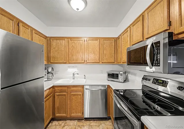 Listing Photo 4 - Condo for sale in building located at 3336 S Ammons St, Lakewood, CO 80227 - Unit #12-103
