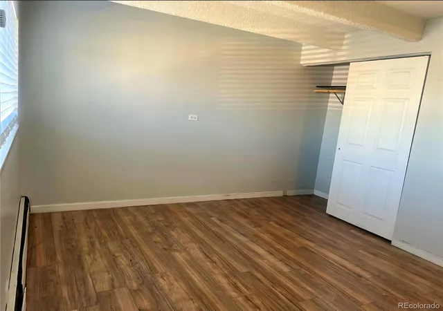 Listing Photo 2 - Condo for sale in building located at 1180 Yosemite St, Aurora, CO 80220 - Unit #