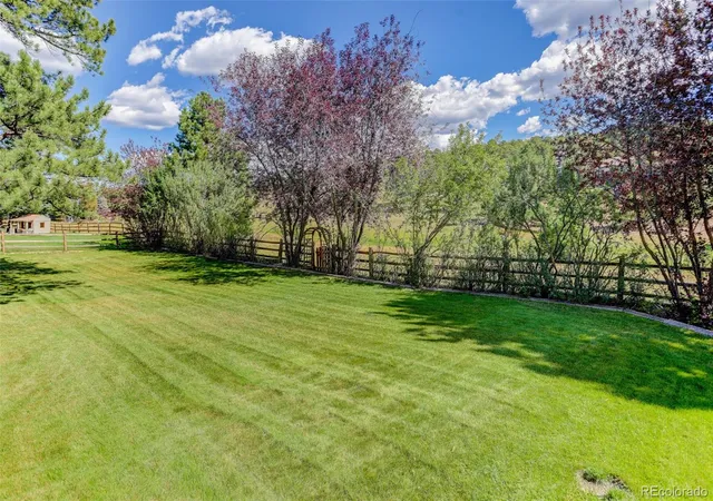 Photo 4 of Single family home for sale at 31667 Broadmoor Dr, Evergreen, CO 80439 | MLS# 8773372 | Listing updated on 2026-10-30