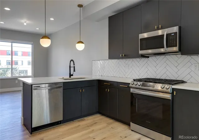Photo 2 of Townhouse for sale at 4925 W 10th Ave #103, Denver, CO 80204 | MLS# 1760033 | Listing updated on 2026-09-13