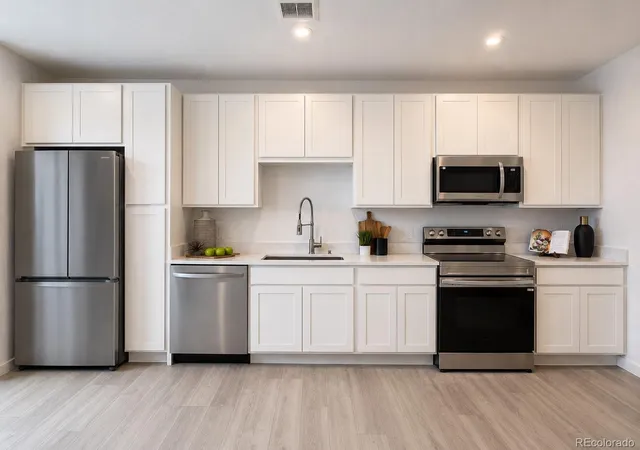 Photo 3 of Condo for sale at 1634 N Sheridan Blvd #105, Denver, CO 80204 | MLS# 3685965 | Listing updated on 2026-09-25