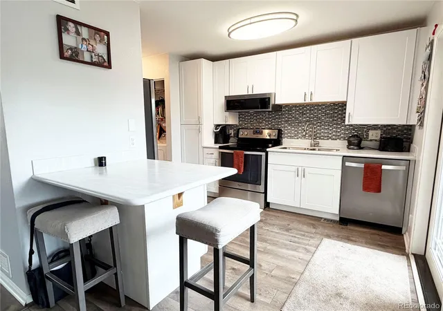 Photo 1 of Townhouse for sale at 13025 W 63Rd Pl #D, Arvada, CO 80004 | MLS# 7789266 | Listing updated on 2026-10-29