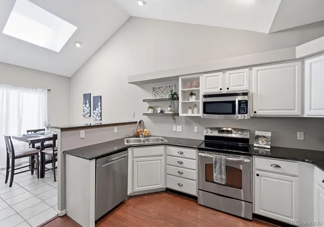 Photo 3 of Townhouse for sale at 8469 S Upham Way, Littleton, CO 80128 | MLS# 4474498 | Listing updated on 2026-09-23